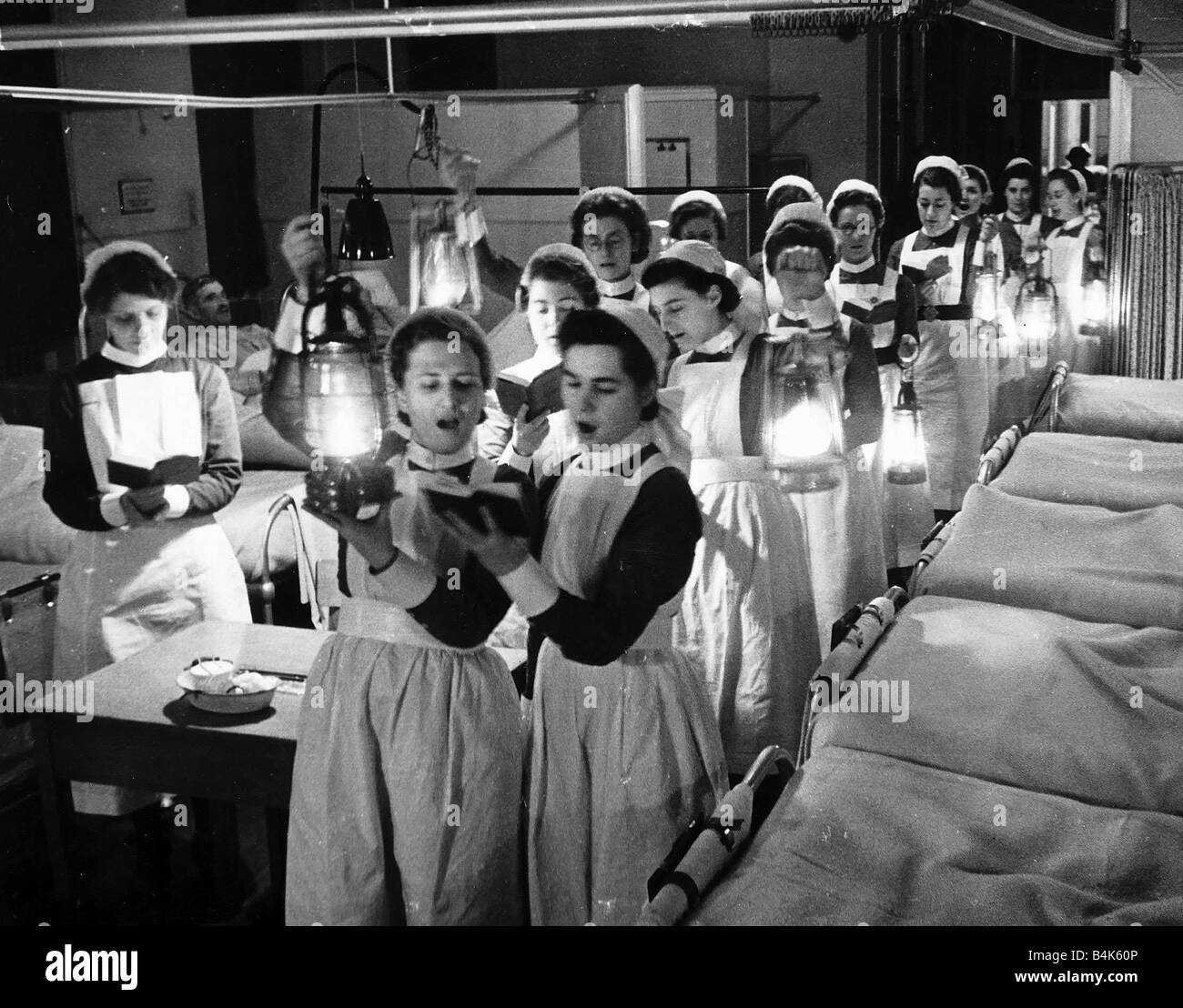 Nurses sing carols on Christmas Eve to patients in hospital in the ...