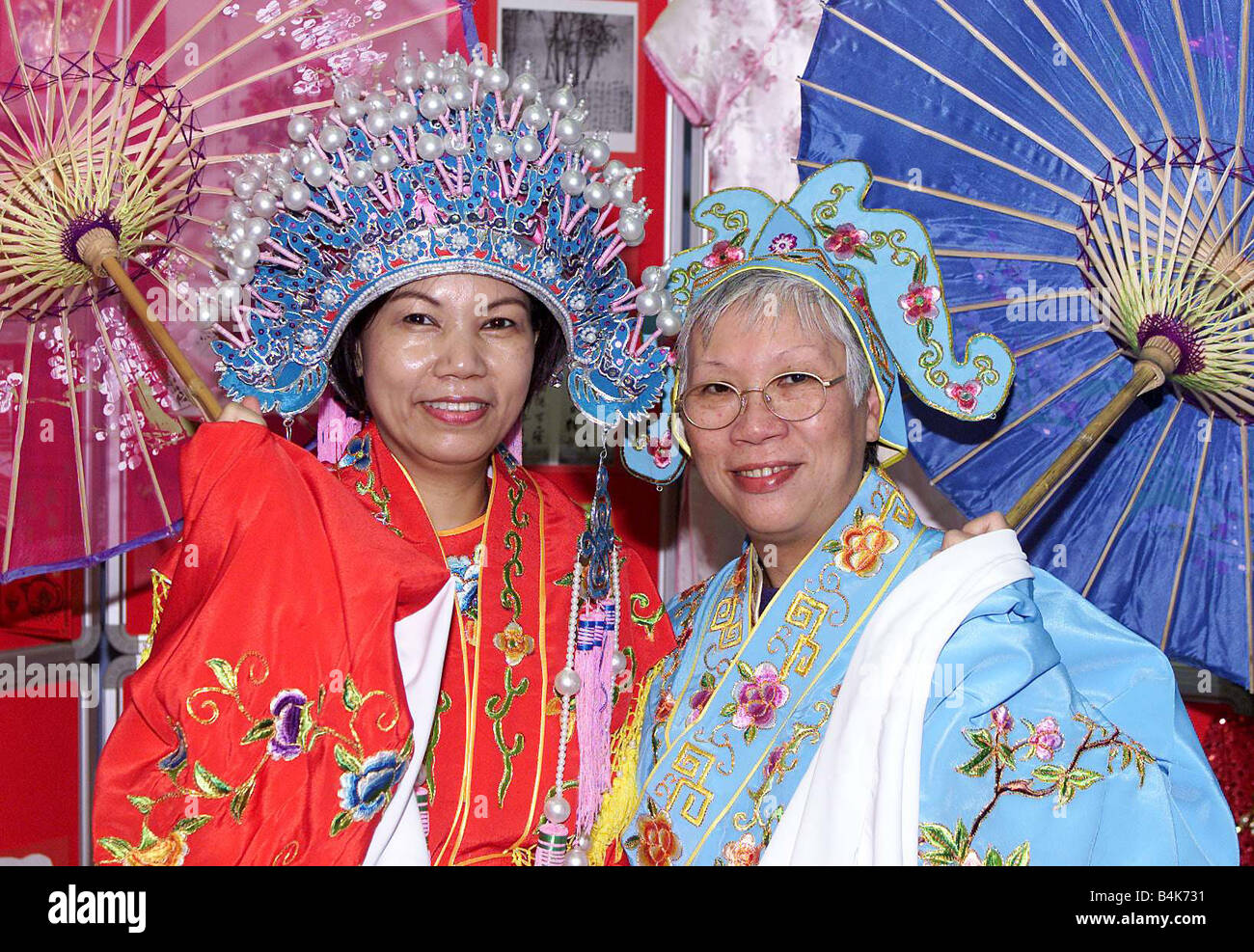 Chinese New Year Cultural Awareness Week February 2003 Yuk Ping Cheung left and Stella Tsang in traditional costumes at the Chinese New Year Cultural Awareness Week Stock Photo