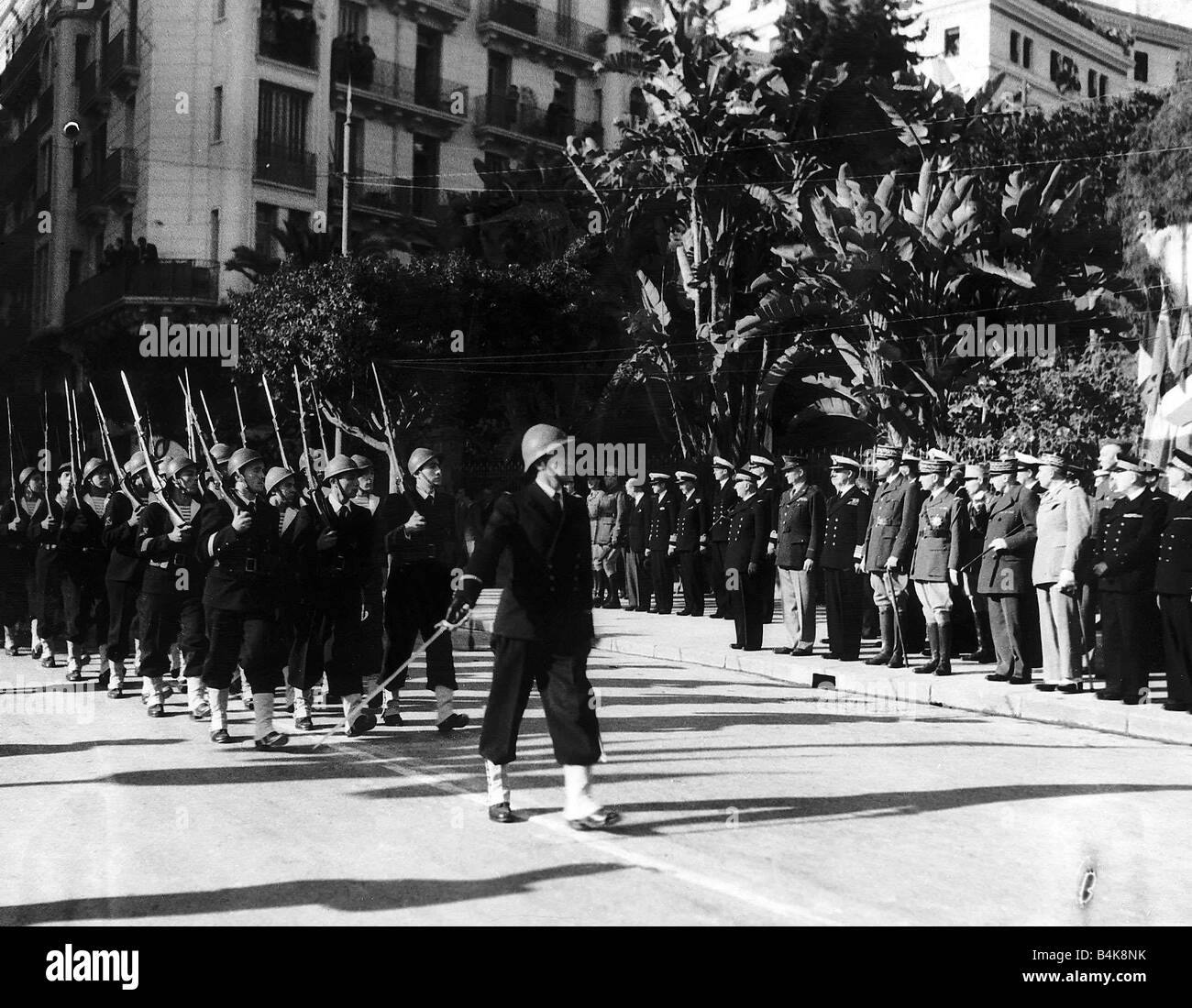 WW2 Parade in Algiers in honour of the Allied soldiers who fell in battle General Eisenhower accompanied by General Giraud Admiral Sir Andrew Cunningham Admiral Darlan review the troops during march past 1942 Stock Photo