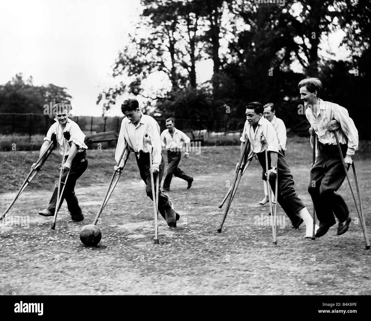 British soldiers wounded in WW2 play football on crutches at Stretton