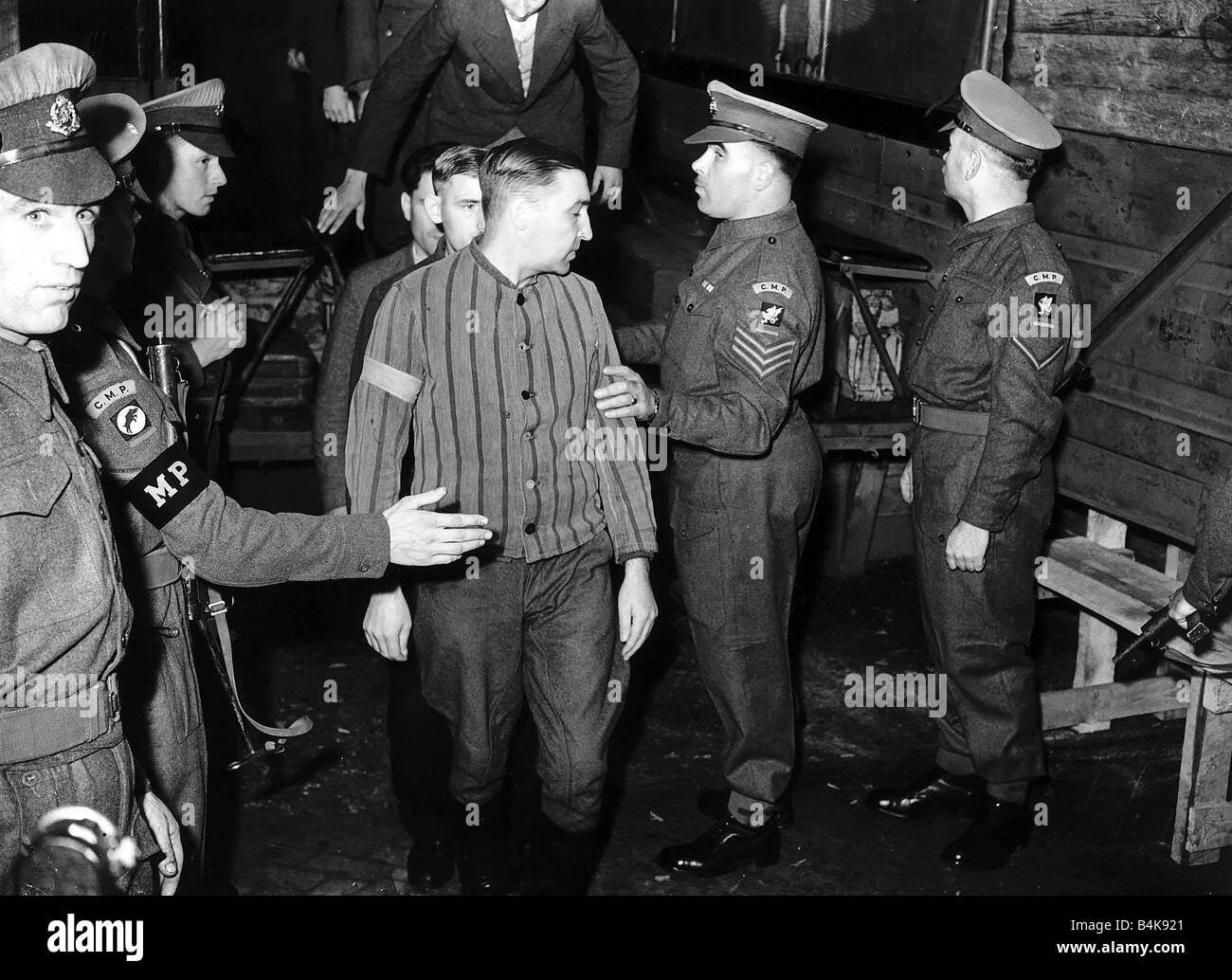 WW2 War Crimes Trial at Luneberg 1945 Prisoners arrive including Josef Kramer Stock Photo