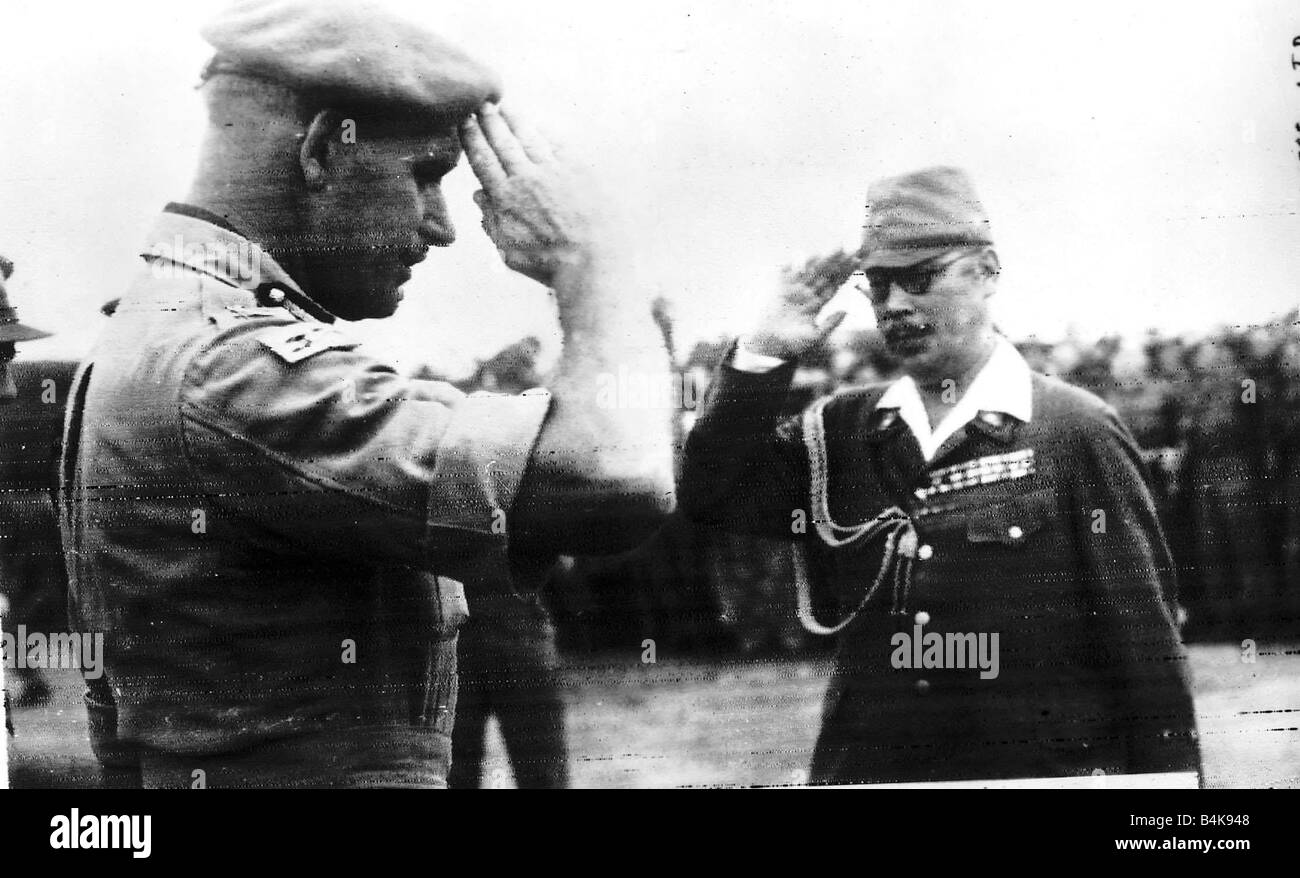 WW2 Japanese surrender Aug 1945 Two commanders salute each other at Mingaladon Airfield Stock Photo