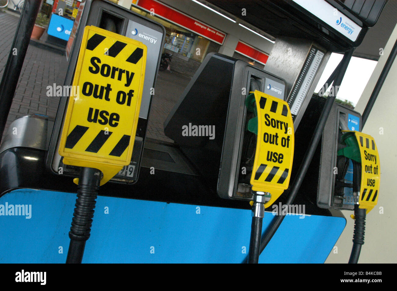 Sorry out of use signs at petrol pumps Stock Photo