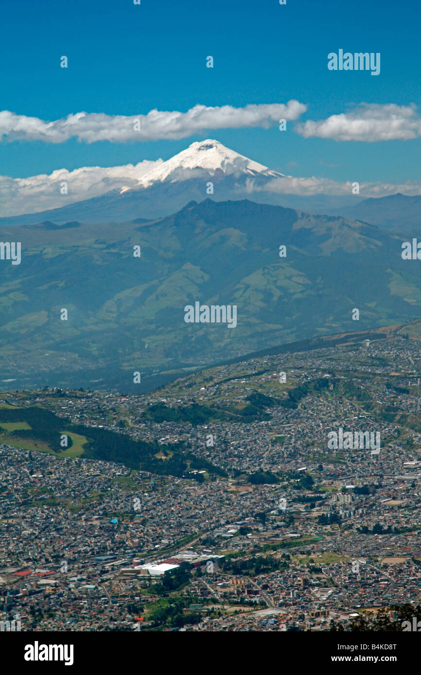 View of Quito and Cotopaxi volcano, from summit of Pichincha volcano, Quito, Ecuador. Stock Photo