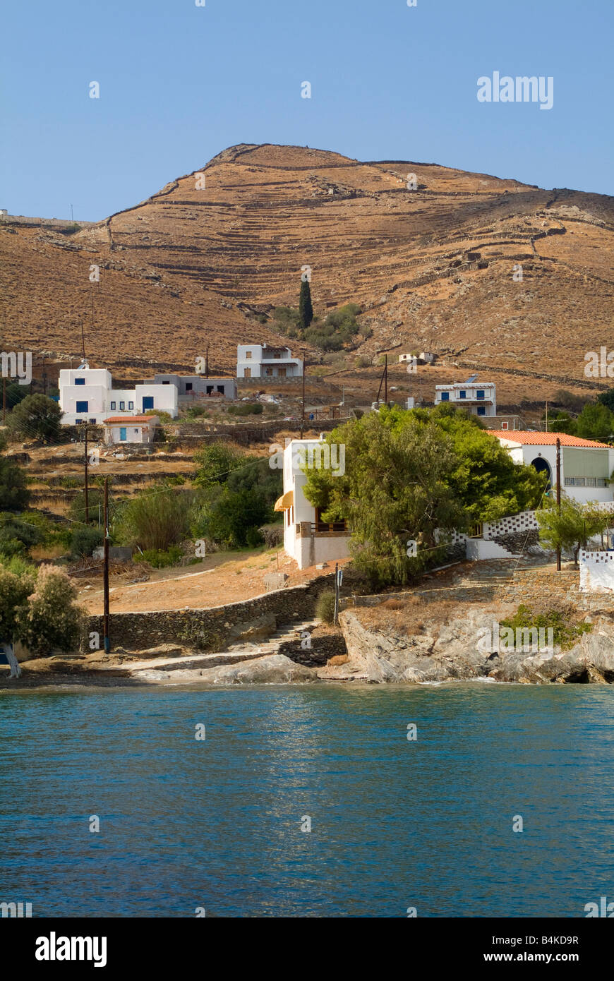 Holiday Homes Overlooking Lousa Bay on the Island of Kithnos Cyclades Islands Aegean Sea Greece Stock Photo
