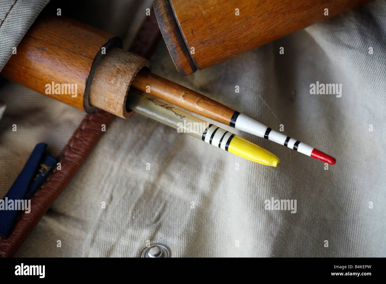 Vintage fishing floats, nestled between the pages of old book on Angling  Stock Photo - Alamy