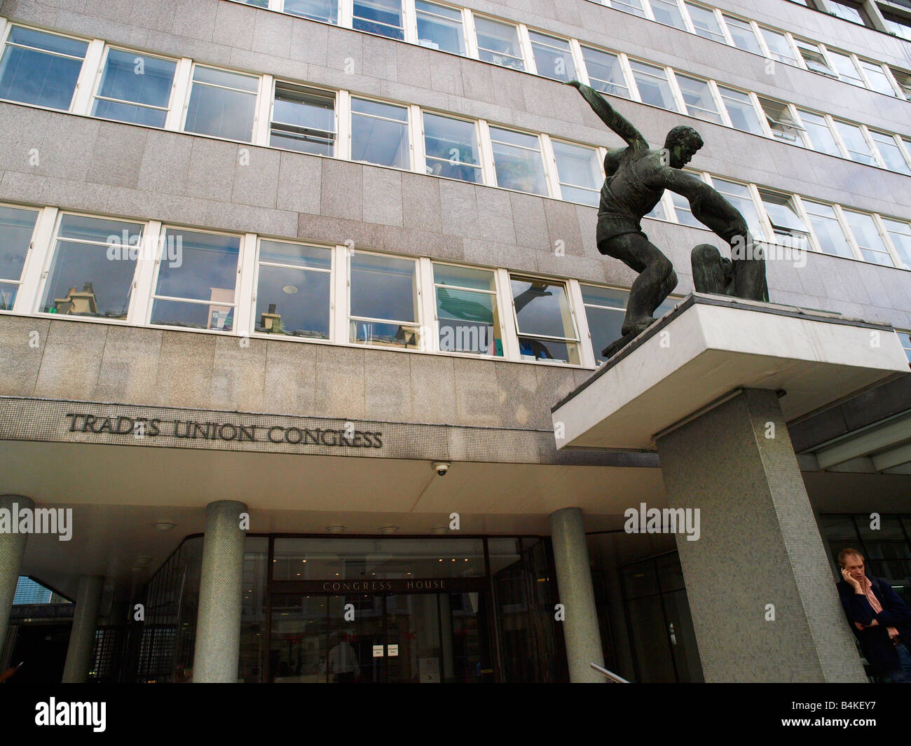 Trades Union headquarters building with bronze sculpture by Bernard Meadows representing the spirit of trade unionism. Stock Photo