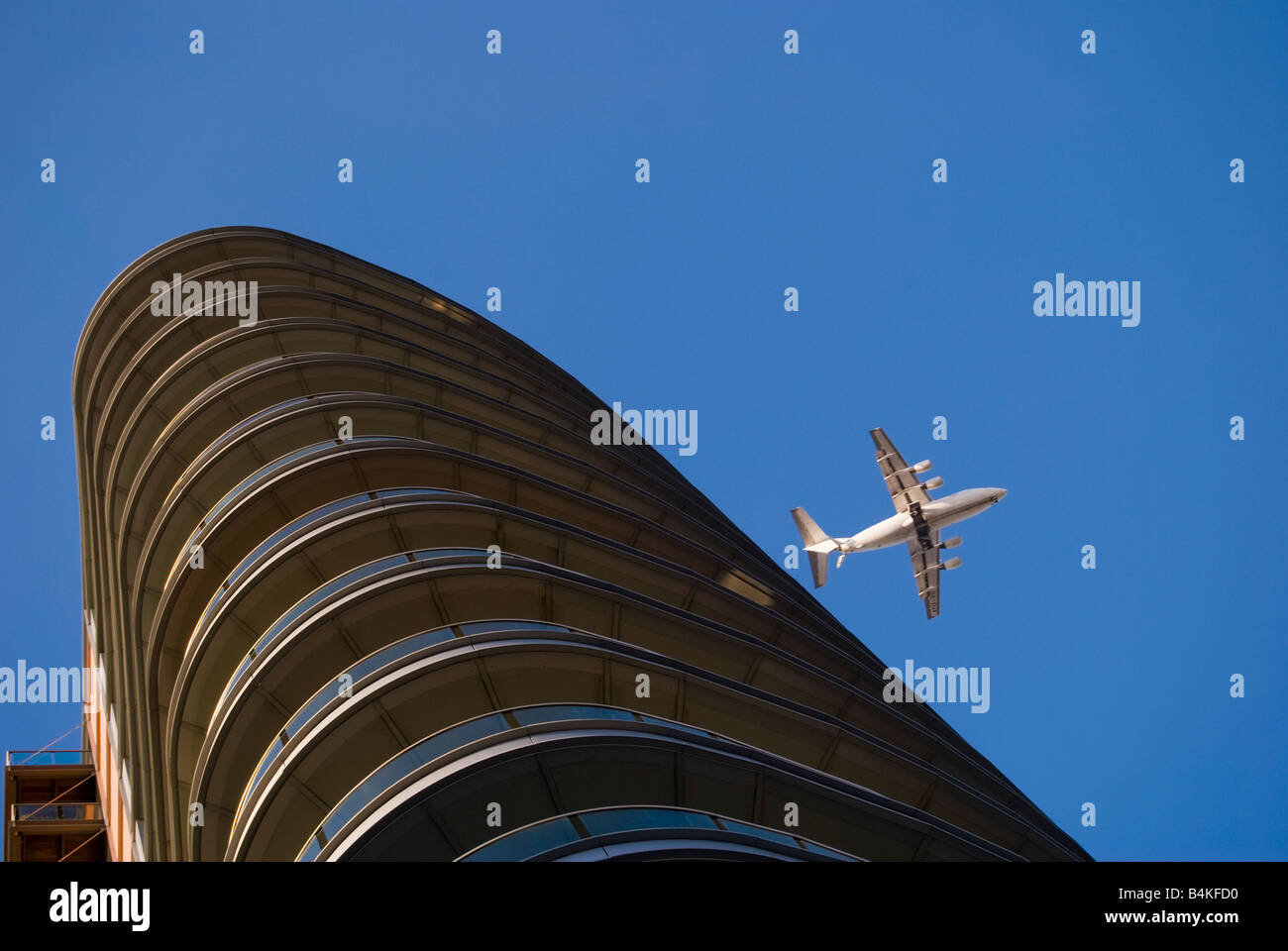 Apartments and air plane over city of London UK Stock Photo