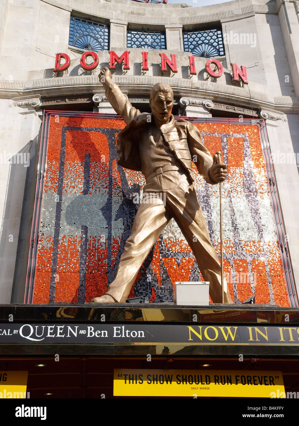 Giant golden statue of the Queen lead singer Freddie Mercury Dominion Theatre Tottenham Court Road London Stock Photo