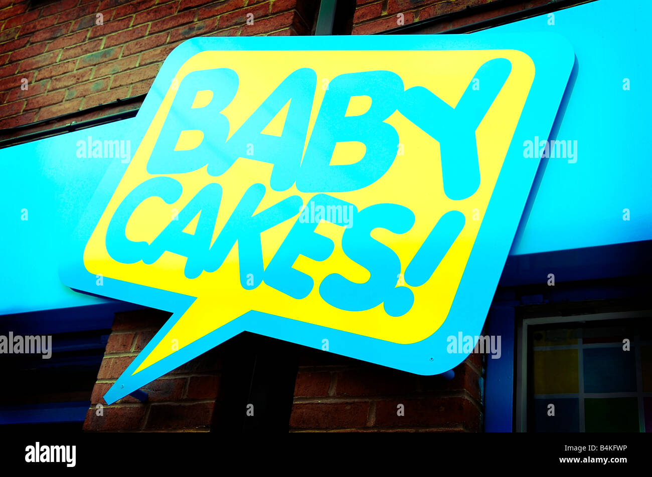 babycakes store shop sign yellow blue edge street manchester