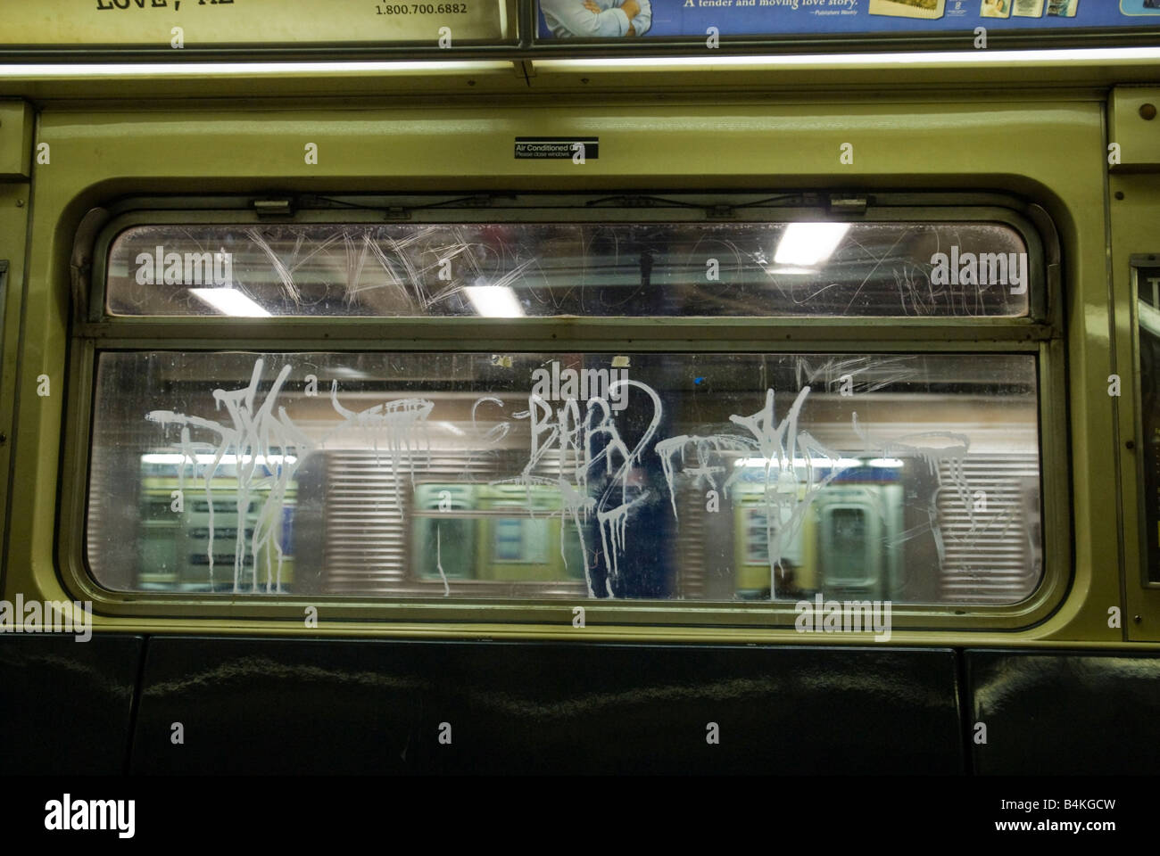 Acid etched graffiti in the New York subway Stock Photo
