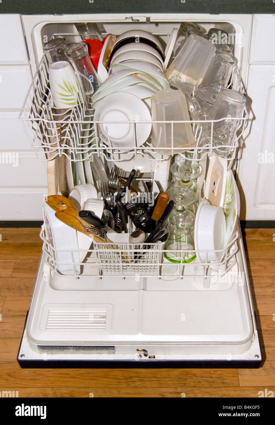 A full dishwasher ready to go It is all loaded up with dirty dishes