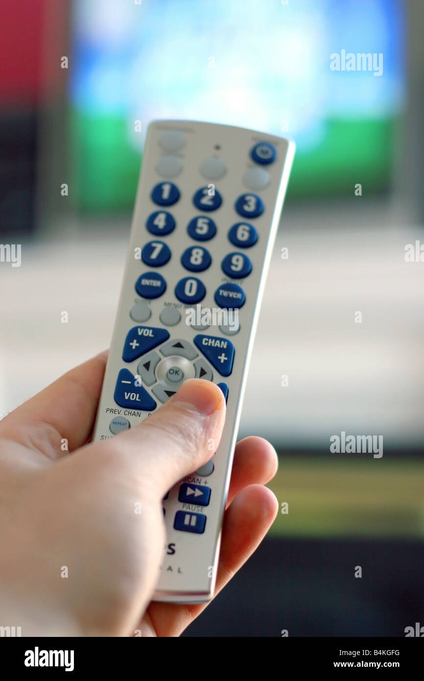 A remote control in action shallow depth of field with focus on the remote Stock Photo