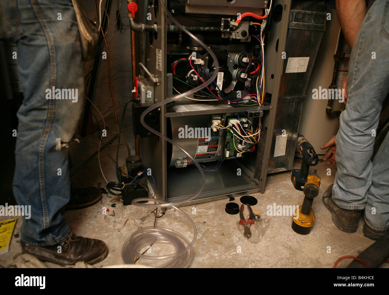 Installation of new highefficiency gas furnace Stock Photo Alamy