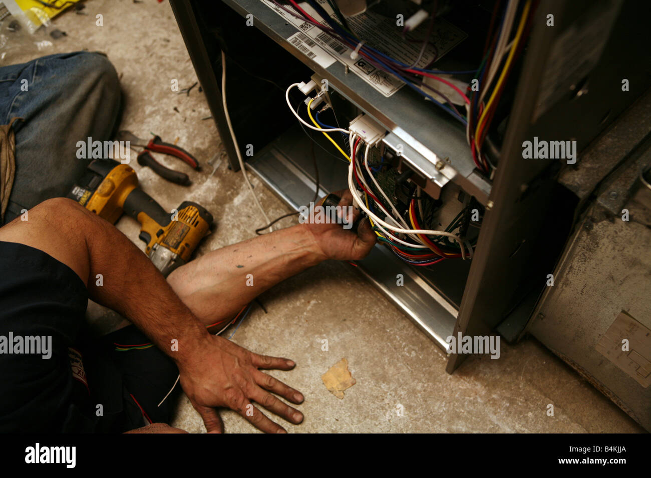Installation of new highefficiency gas furnace Stock Photo Alamy