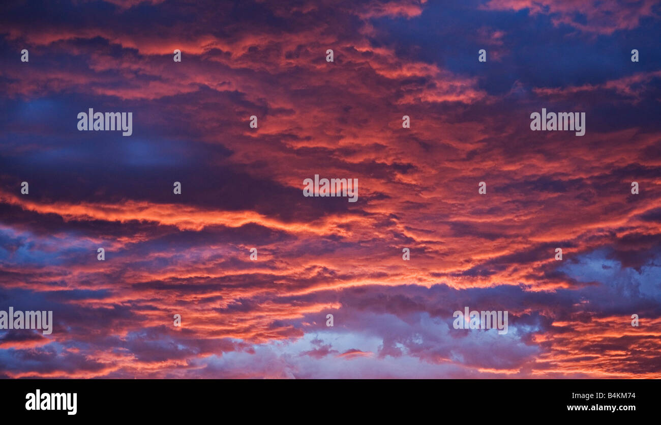 A scenic view of a distant clouds in the sunset pan in Oshikoto Region Namibia Stock Photo