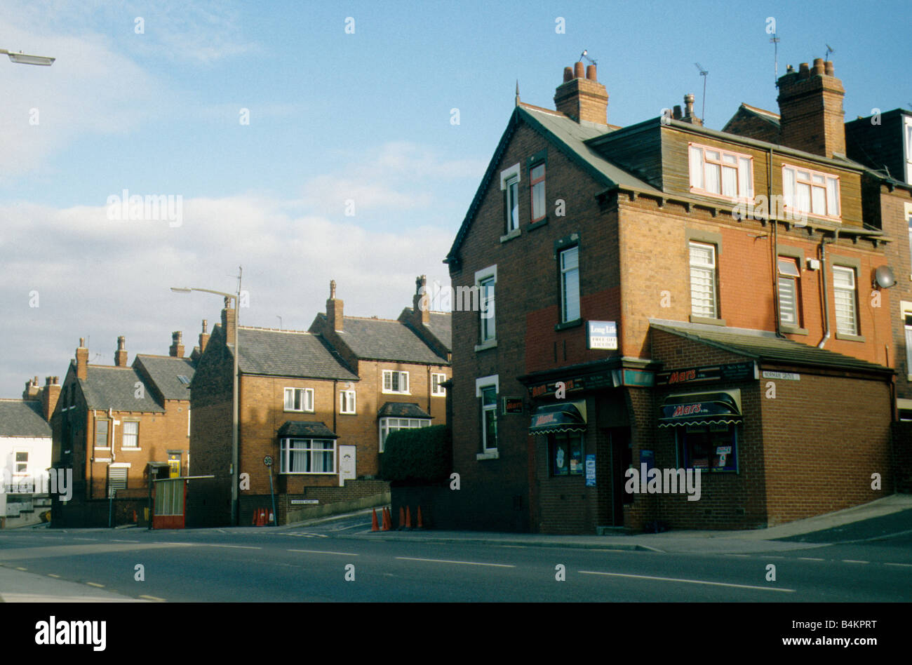 Leeds, back to back houses and corner shop in Abbey Road, Kirkstall. Stock Photo