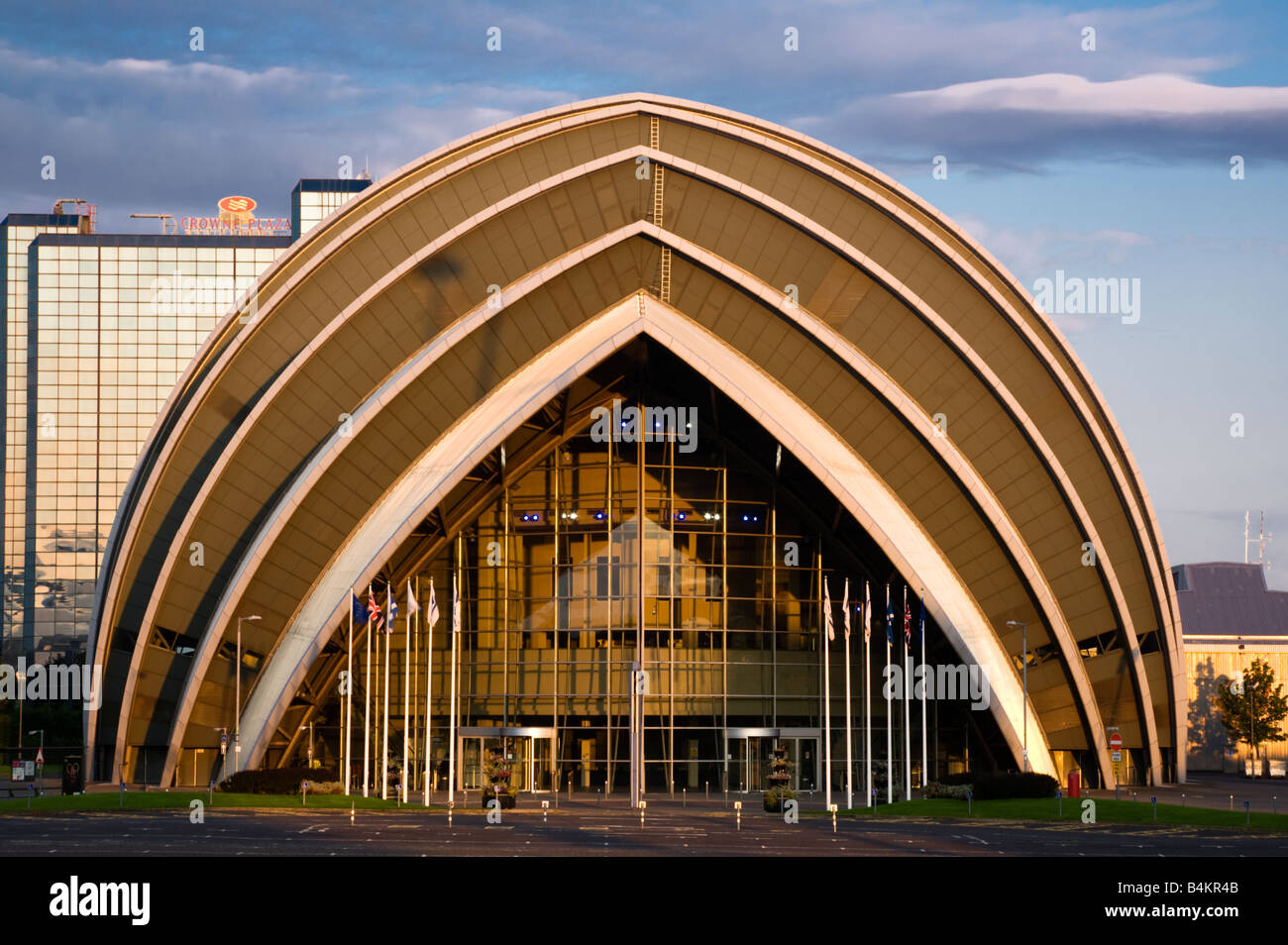 The Clyde auditorium locally known as the Armadillo and Crowne Plaza Hotel at sunrise, Glasgow, Scotland. Stock Photo