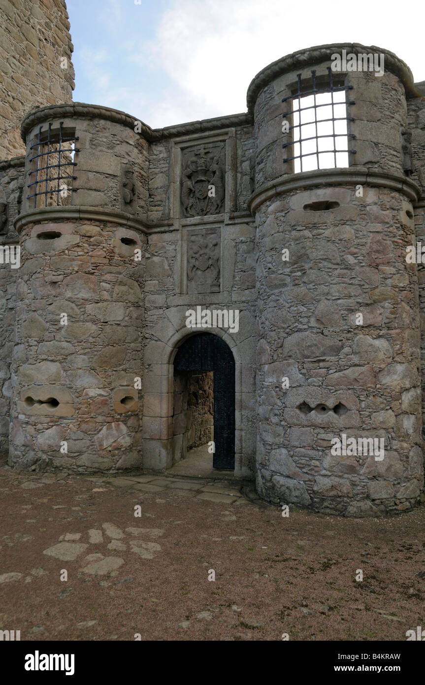 The grand entrance to the castle with unusual gun ports Stock Photo