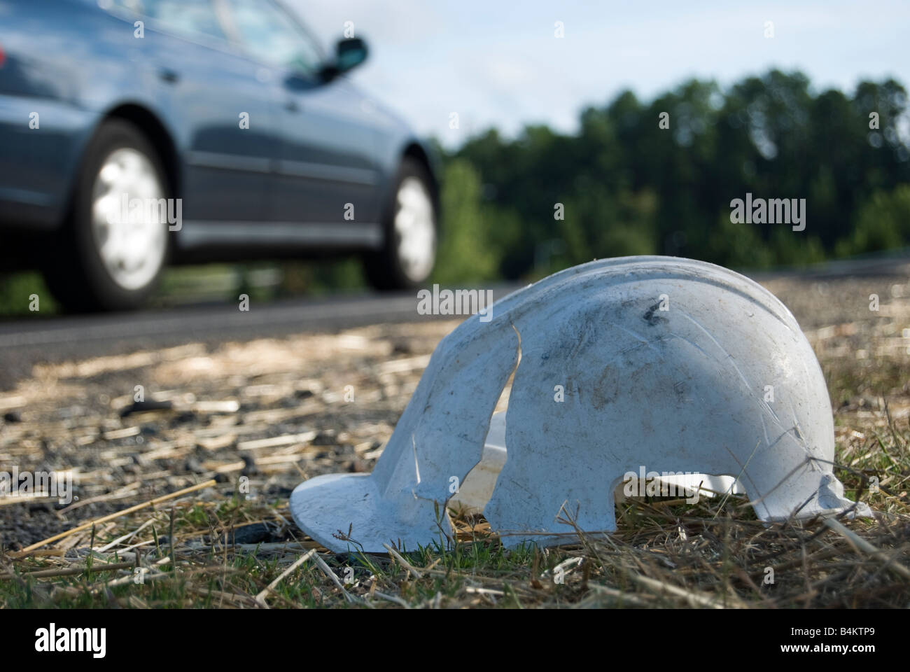 Broken hard hat helmet in the ditch at the side of highway 85 in Durham