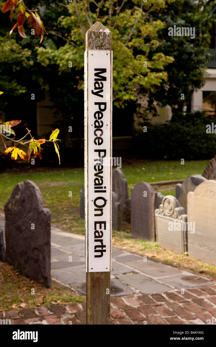 A Peace Pole is a monument that displays the message "May Peace Prevail on Earth,” usually in a different language on each side. Stock Photo