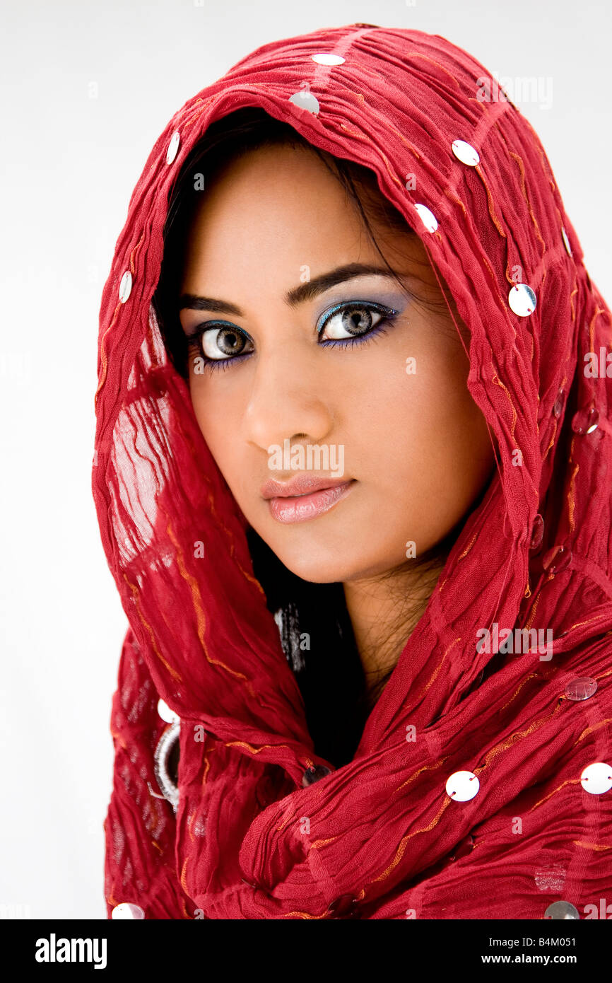Beautiful woman with red head scarf isolated Stock Photo Alamy