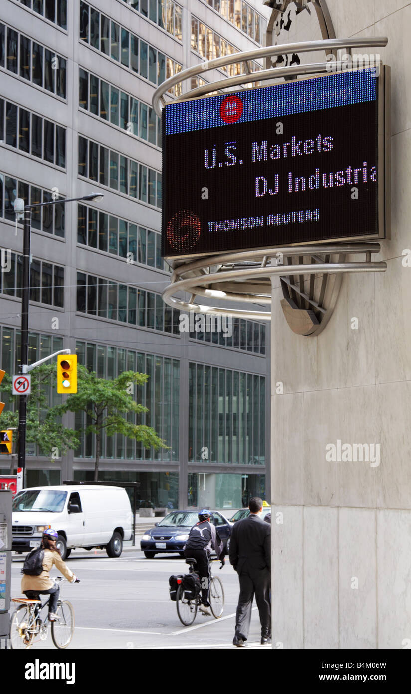 Live US stock market announcement board at King and Bay Financial District in Toronto Canada Stock Photo