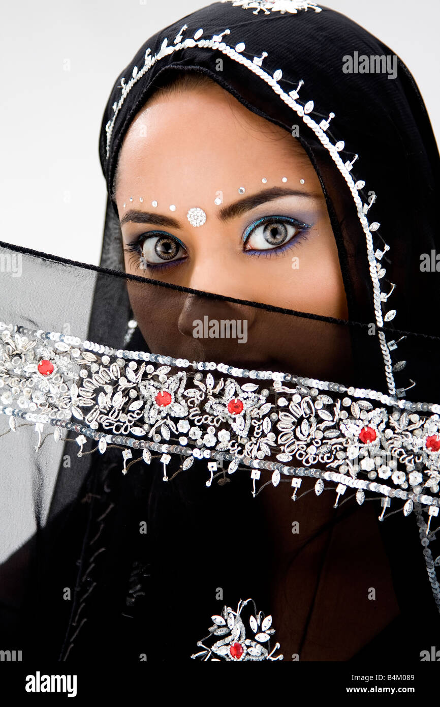 Beautiful woman with black head scarf isolated Stock Photo