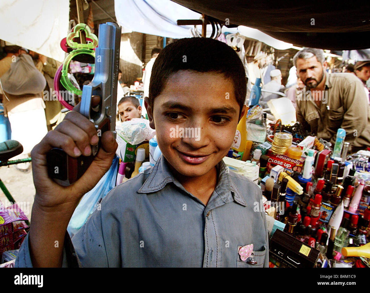 Boy shows gun hi-res stock photography and images - Alamy