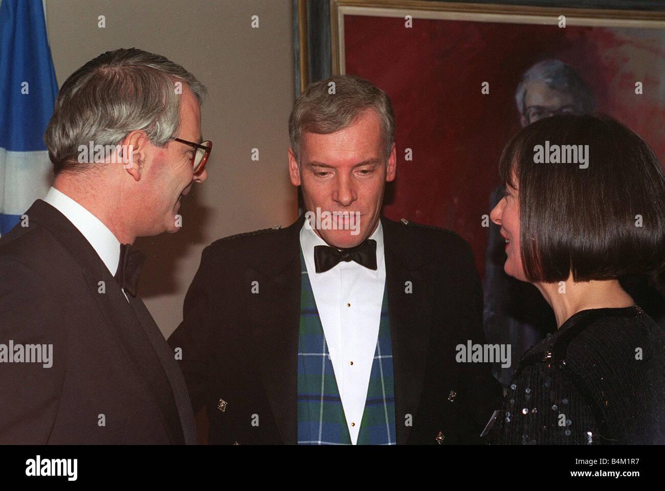 John Major Prime Minister and Leader of the conservative Party talking to Scottish party chairman Sir Michael Hirst Circa 1993 Stock Photo