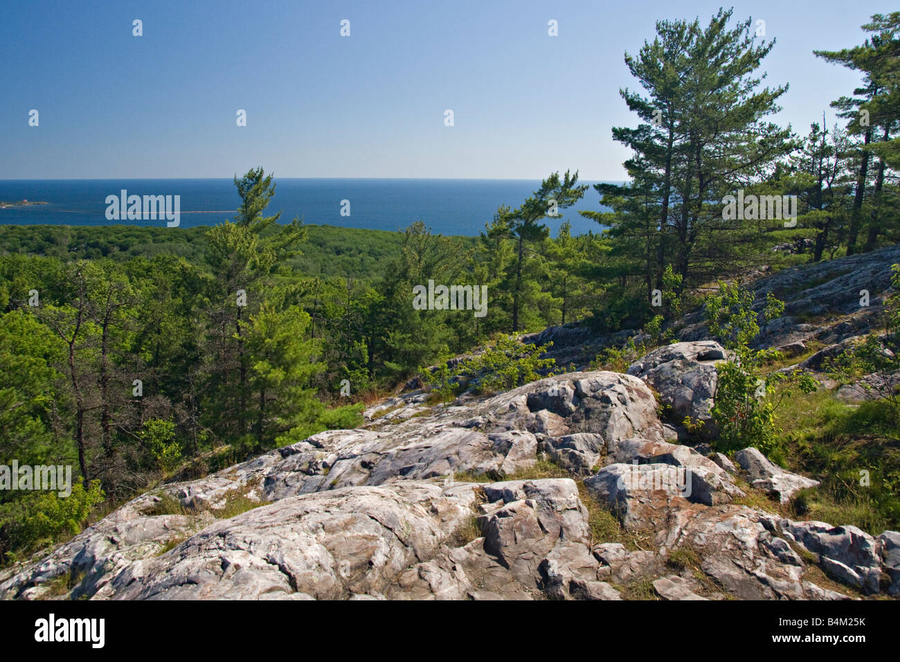 Rocky cliffs and Lake Superior at the Mount Marquette overlook in Marquette Michigan Stock Photo