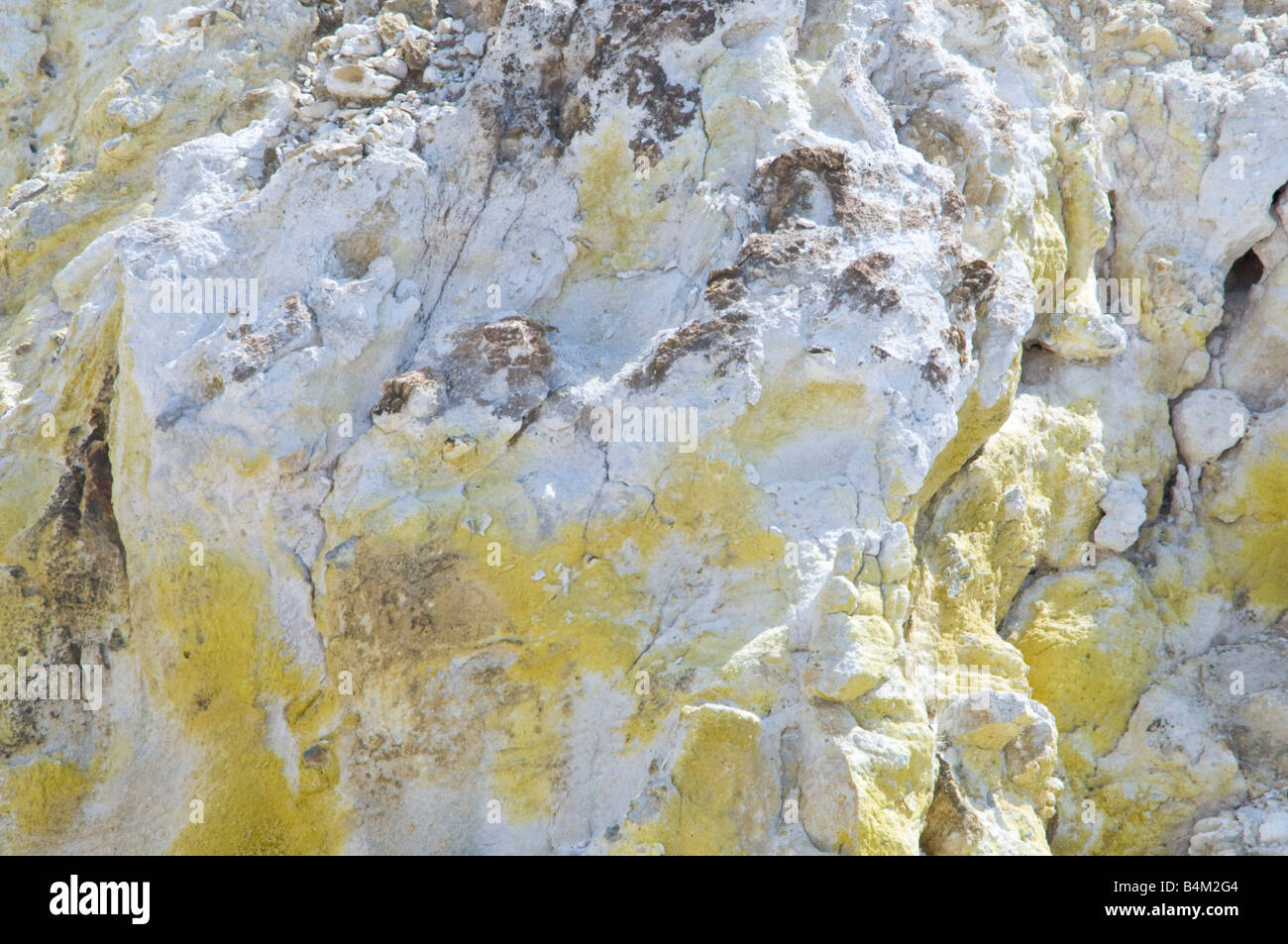 Sulphur staining of rock at Solfatara Stock Photo