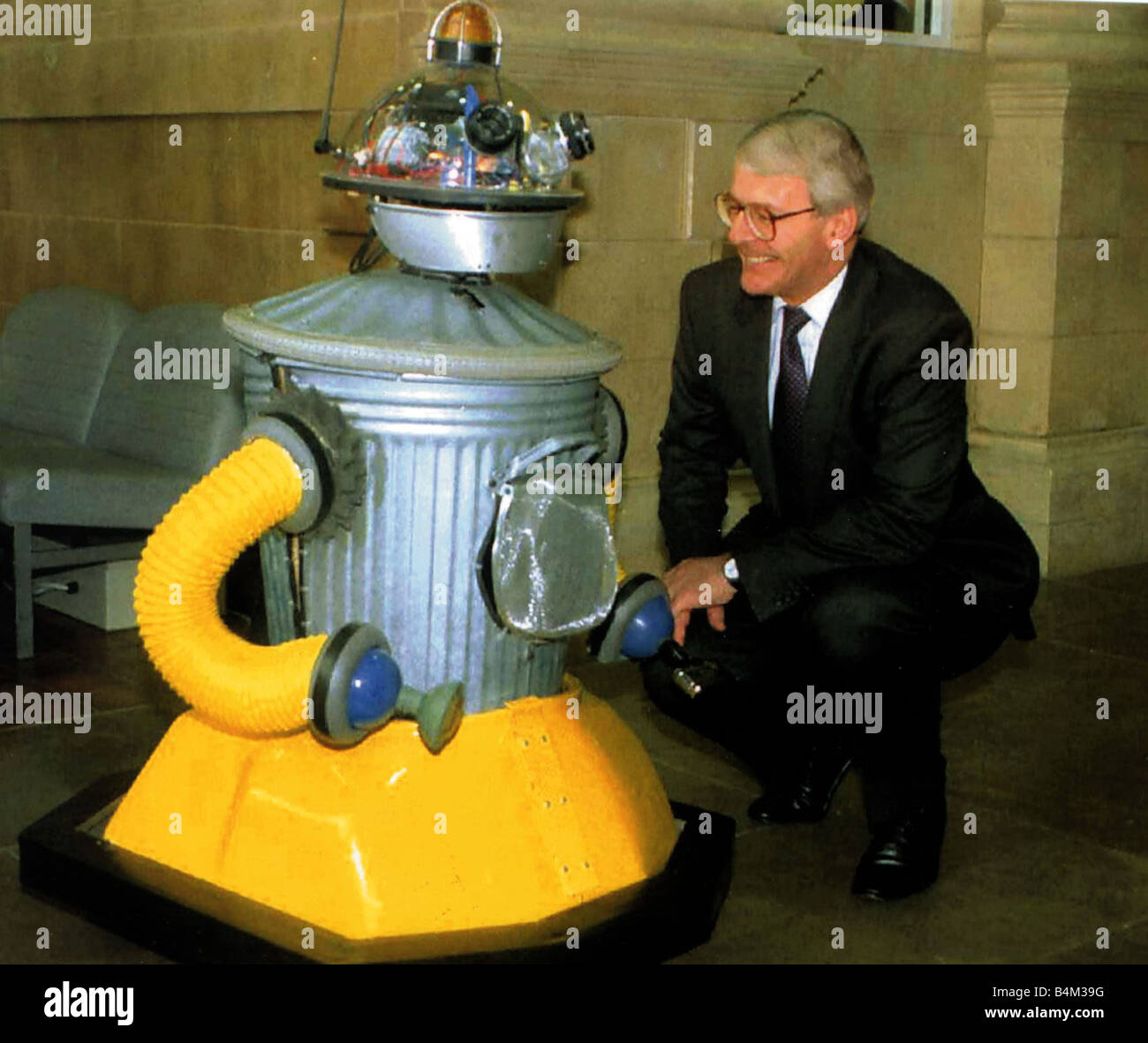 John Major MP British Prime Minister having a lengthy talk with Scoot the robot at Eureka Exhibition in Halifax Stock Photo