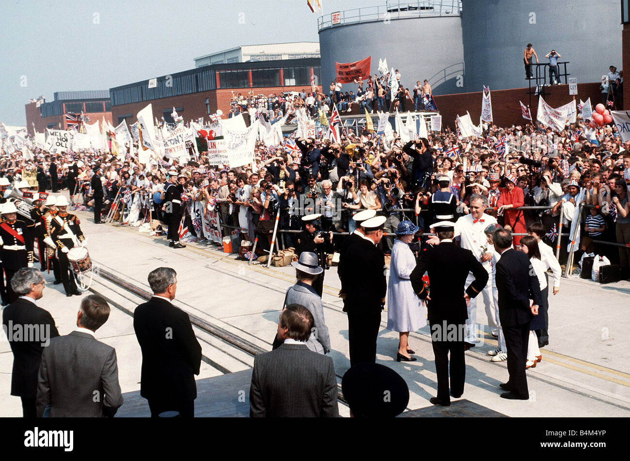 Queen Elizabeth welcomes navy back from Falklands war 1982 after HMS Invincible docks with Prince Andrew aboard Stock Photo