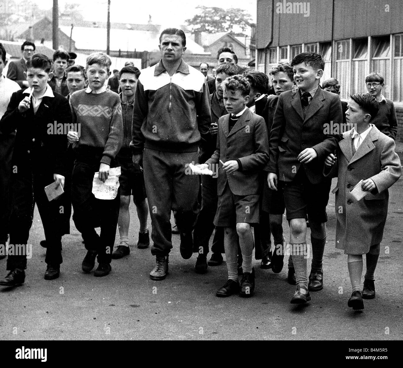 Ferenc Puskas Real Madrid 19th May 1960 Kilmarnock schoolchildren surround football player Ference Puskas asking for autographs Stock Photo