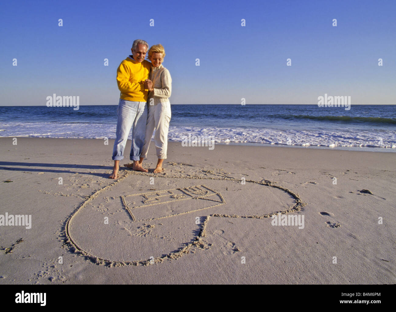 Mature couple new home Stock Photo - Alamy