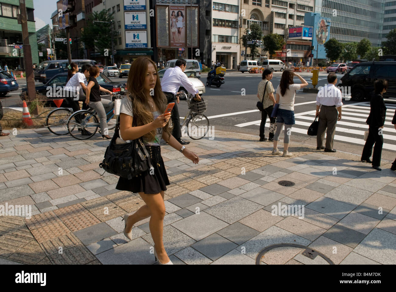 Woman in Omote Sando dori Tokyo Japan. Stock Photo
