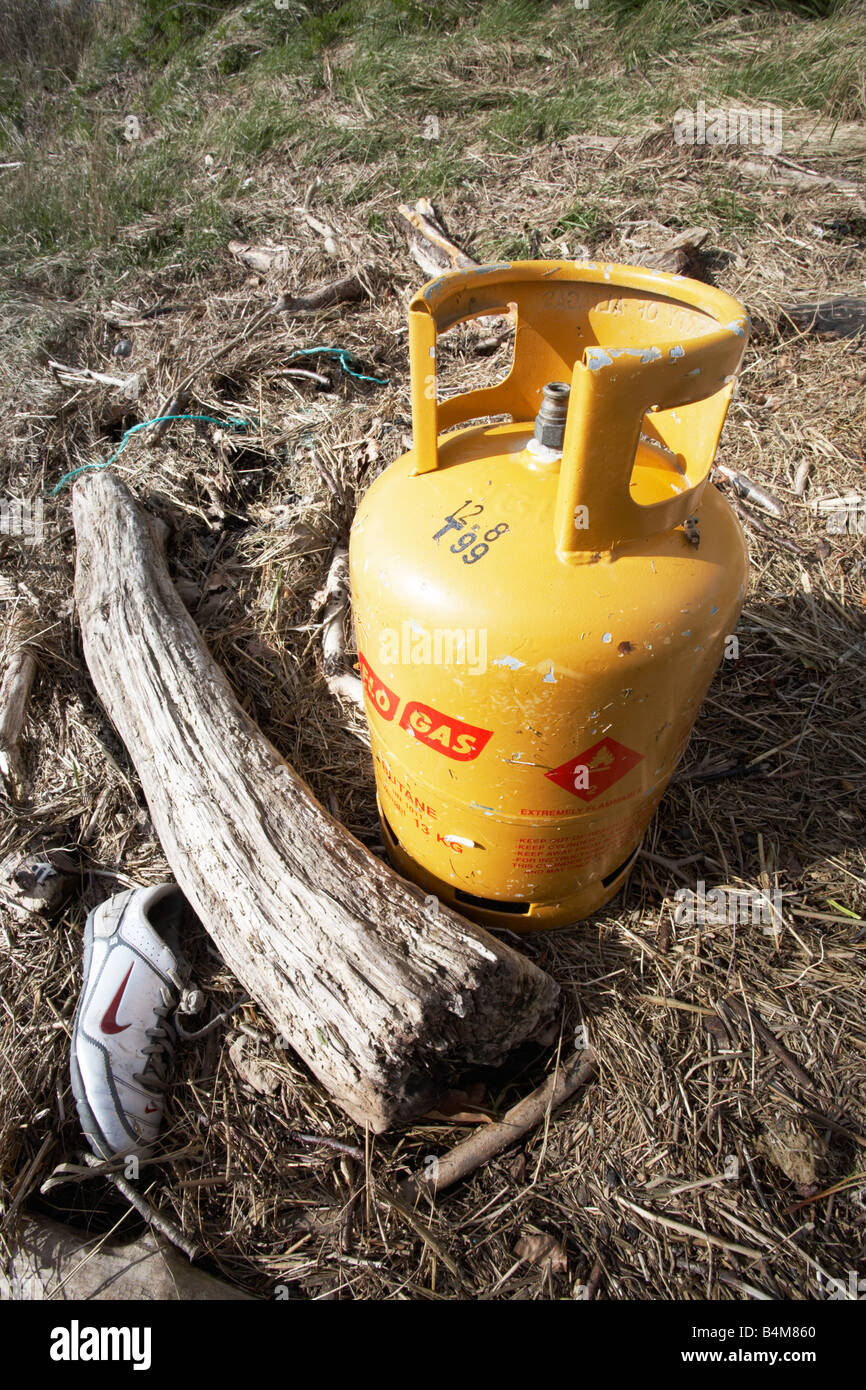 Dumped gas bottle Stock Photo Alamy