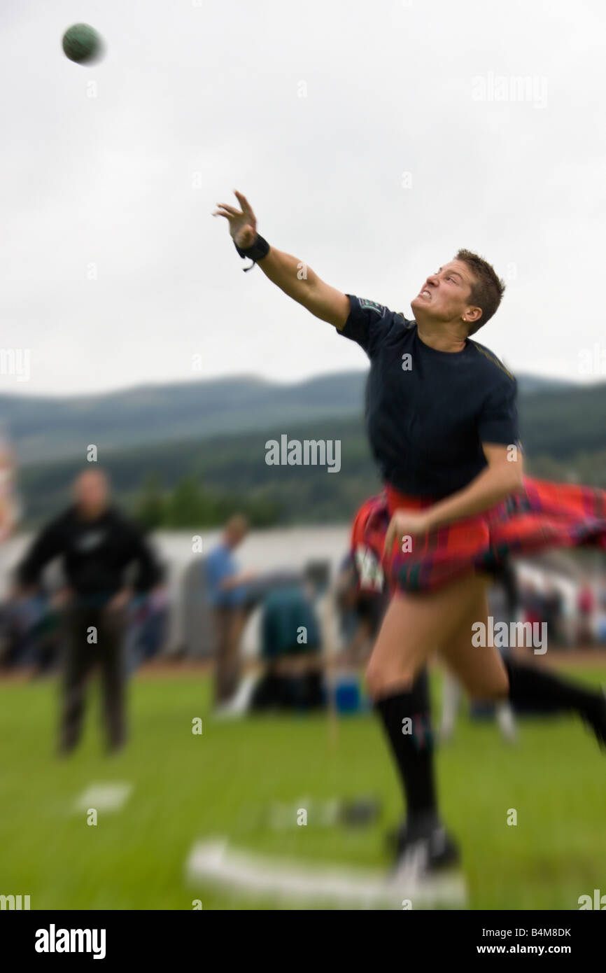 Sportswoman about to Put the Shot at the Cowal Gathering. A traditional Highland Games held each year in Dunoon in Scotland Stock Photo