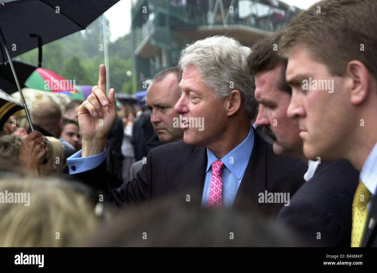 Former President Bill Clinton July 2001 at Wimbledon as rain disrupt ...