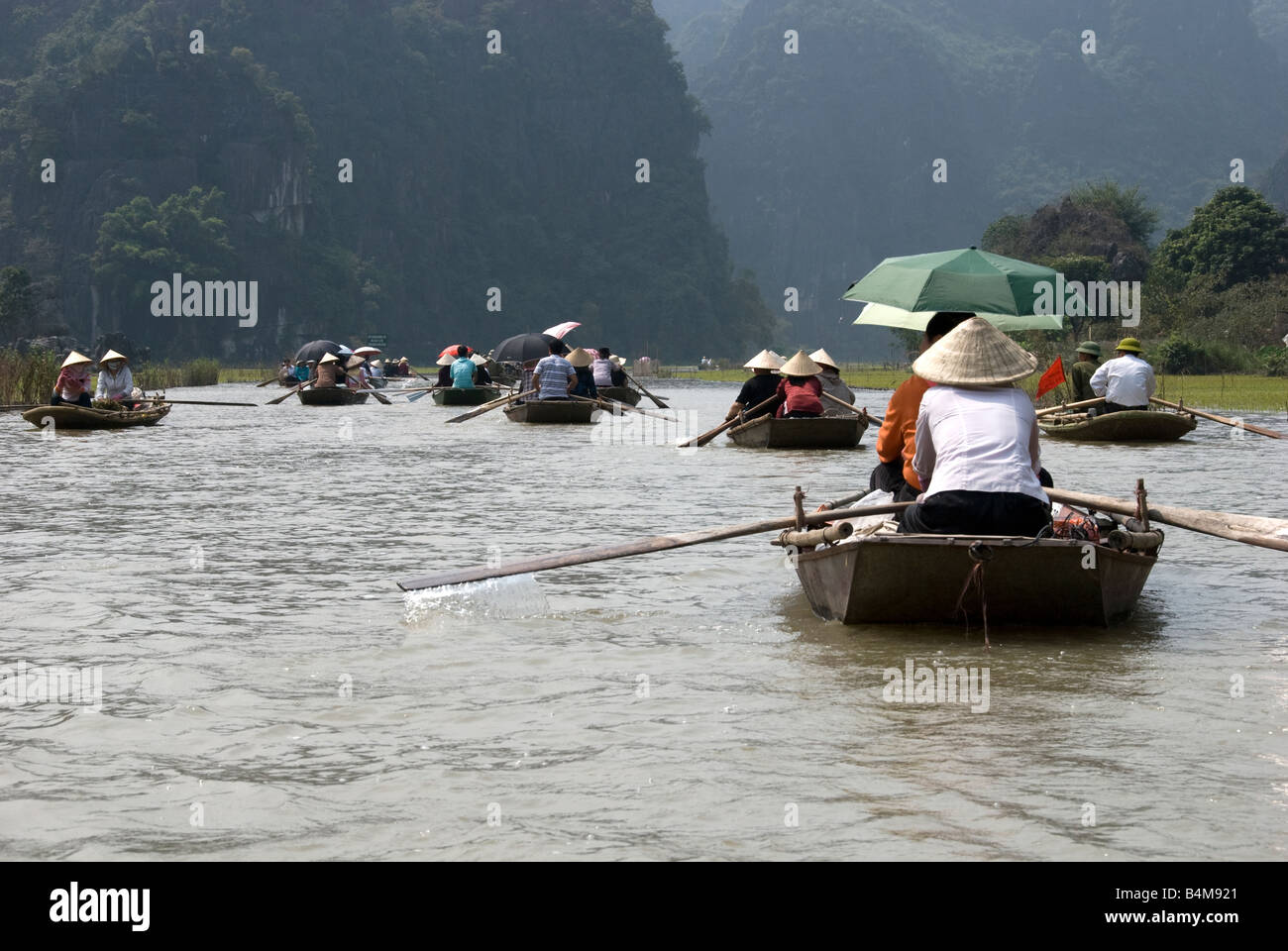 A boat ride on the Ngo Dong River Tam Coc, Vietnam Stock Photo