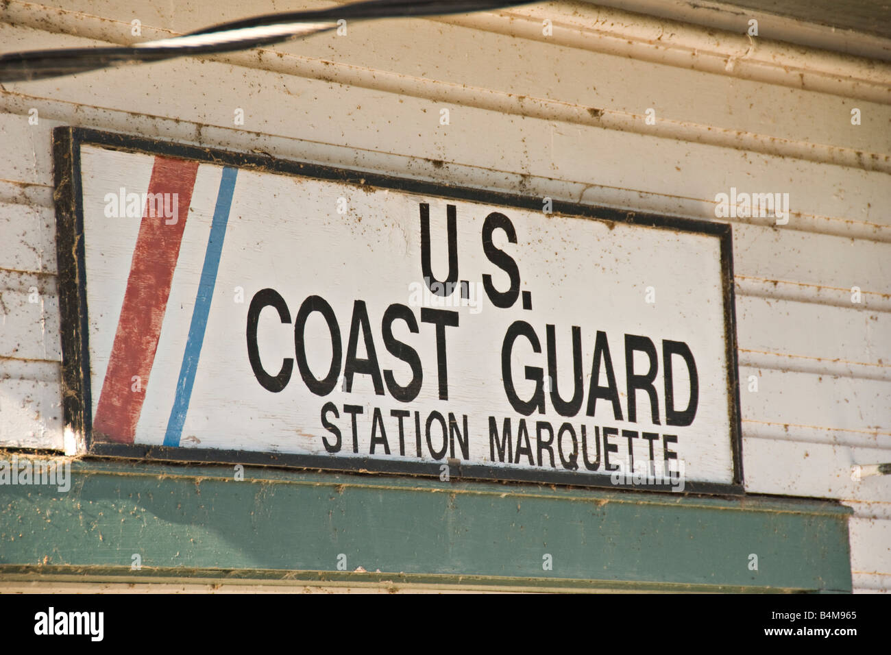 United States Coast Guard station sign in Marquette Michigan Stock Photo