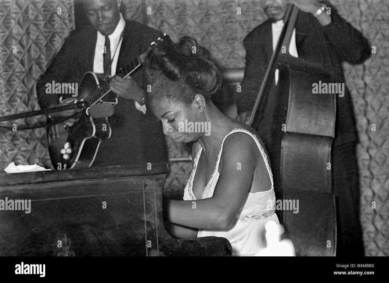 Nina Simone June 1965 Jazz singer Pictured preforming at Annies Club on stage playing piano Eunice Kathleen Waymon Nina Simone singer and songwriter Stock Photo