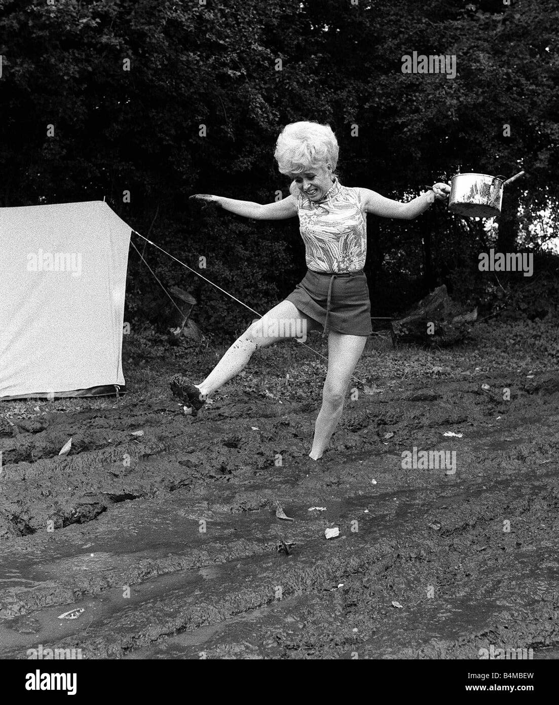 Films Carry On Camping Film 1968 Filming At Pinewood Studios Barbara Windsor Gets Stuck In The Mud Muddy Camp Site Stock Photo Alamy