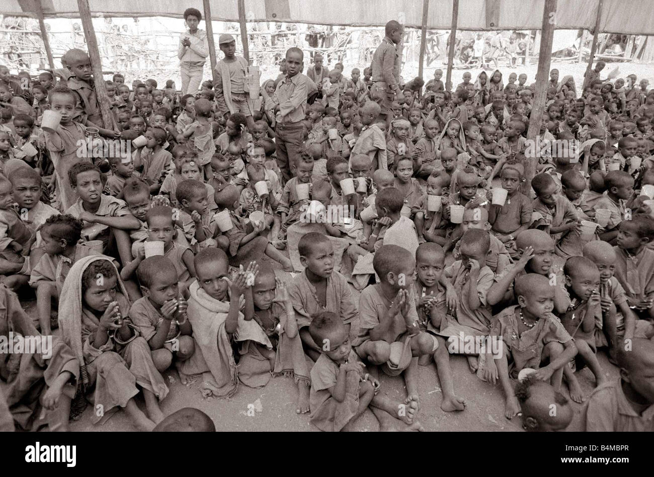 Ethiopia Famine November 1984 Mirror Mercy Flight labels on boxes Locals wait as supplies arrive ...