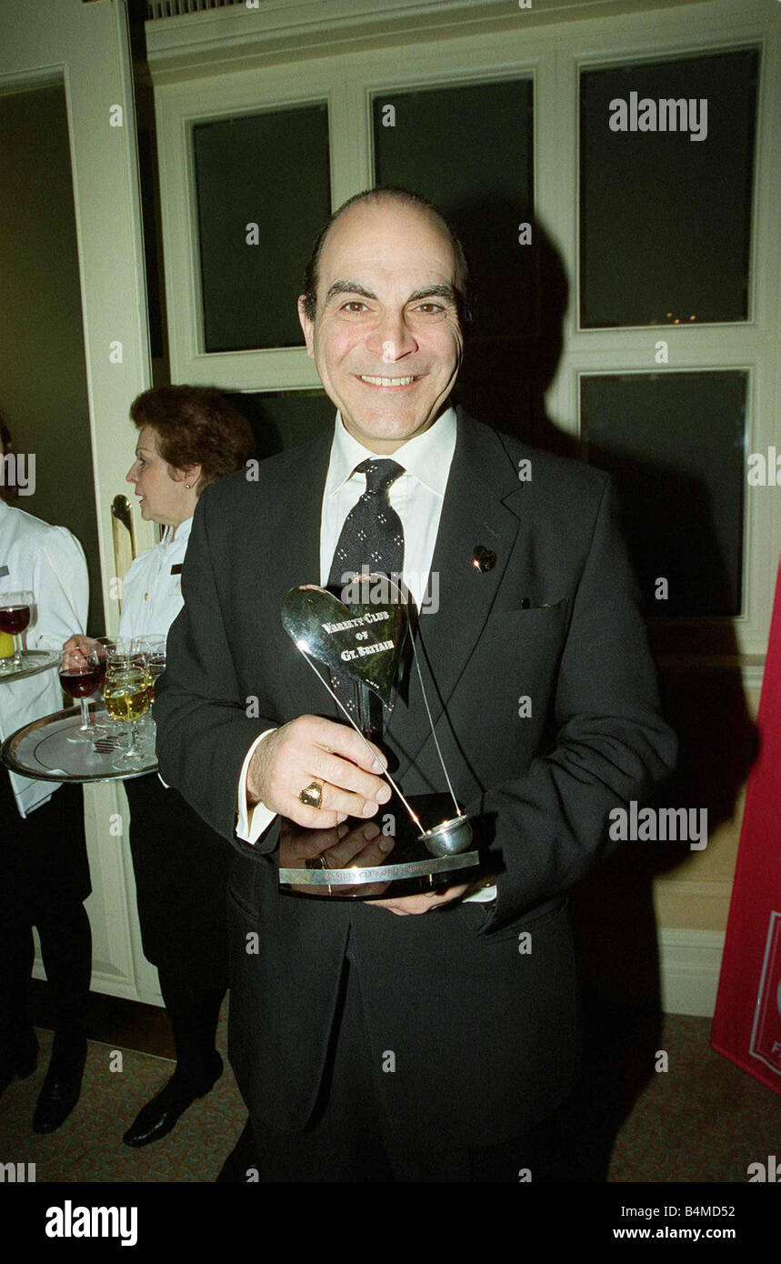 David Suchet actor February 1999 at the London Hilton for the Variety Club of Great Britain show business awards 50th anniversary holding his award Stock Photo