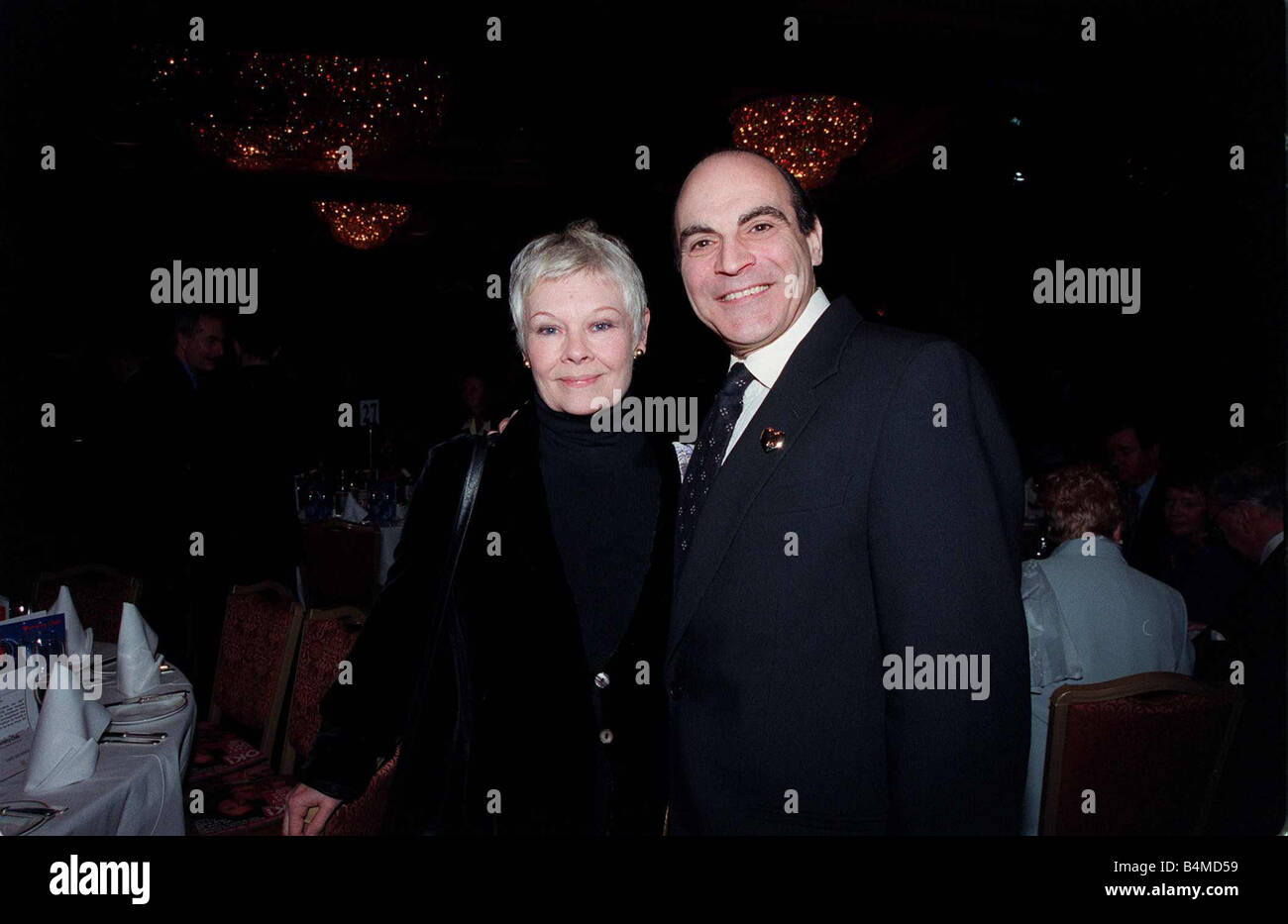 Dame Judi Dench at the London Hilton for the Variety Club of Great Britain show business awards 50th anniversary with fellow actor David Suchet February 1999 Stock Photo
