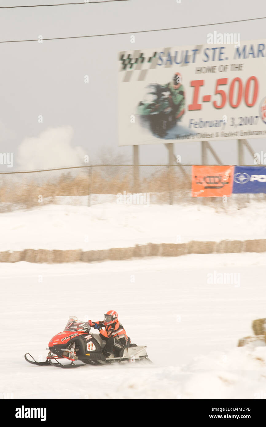 Snowmobile racing action at the I 500 Snowmobile race in Sault Ste