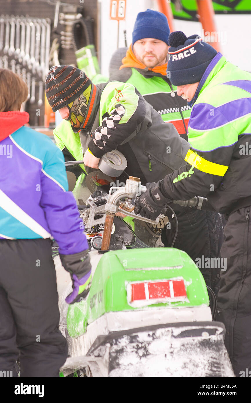 Scenes from the pits of the I 500 Snowmobile race in Sault Ste Marie