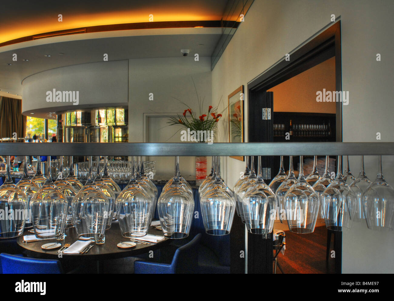 Rows of wine glasses at the Rotunda Restaurant / bar, Kings Place, London Stock Photo